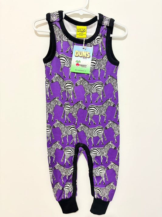 Size 0 (New with tags) DUNS organic cotton onesie purple zebra print.