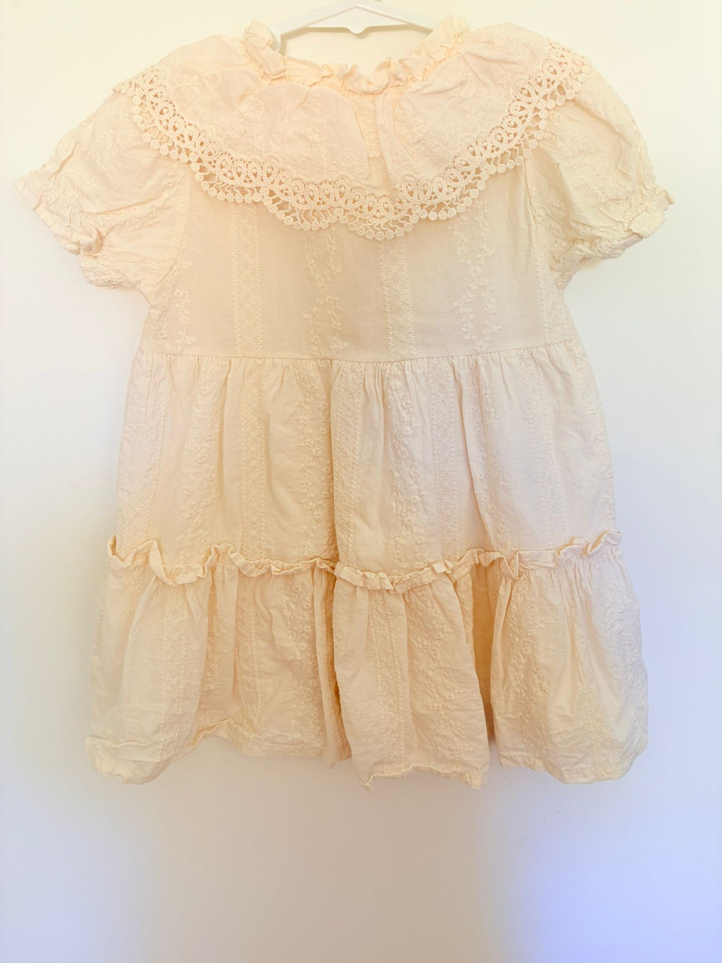 Size 3 (No label) cotton/ lined cream embroidered dress.