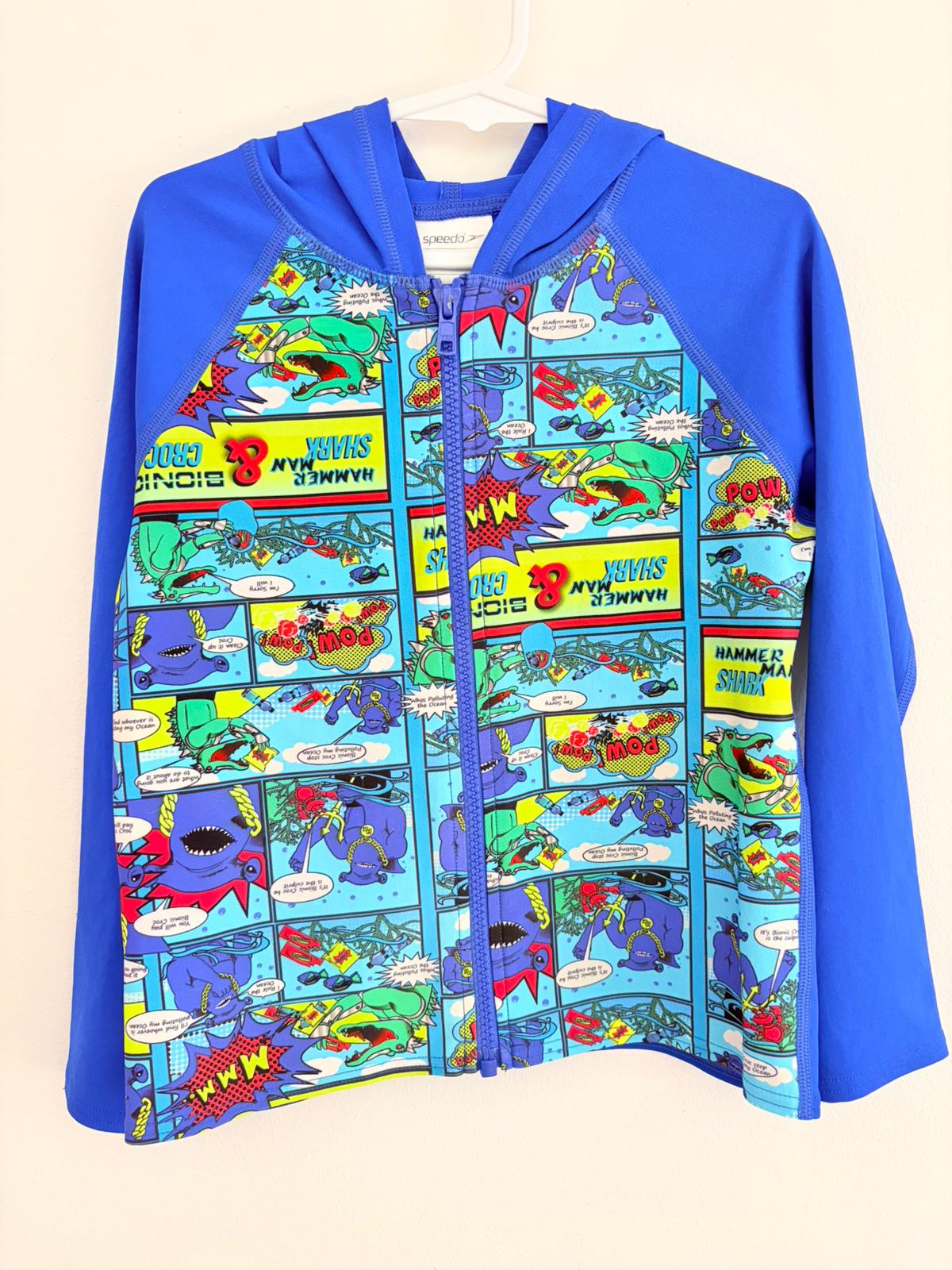 Swimwear size 7 Speedo hooded swim top with comic book print.