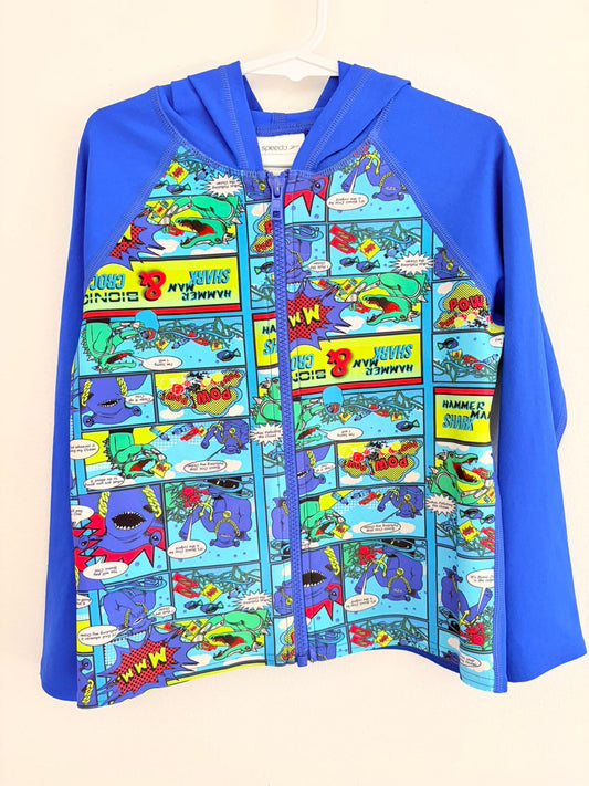 Swimwear size 7 Speedo hooded swim top with comic book print.