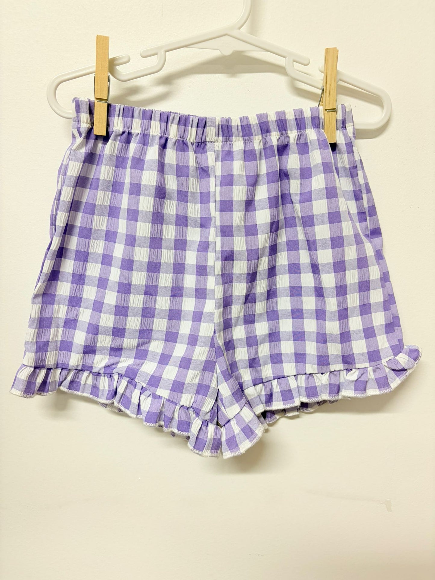 Size 3 Shein lilac check shorts.