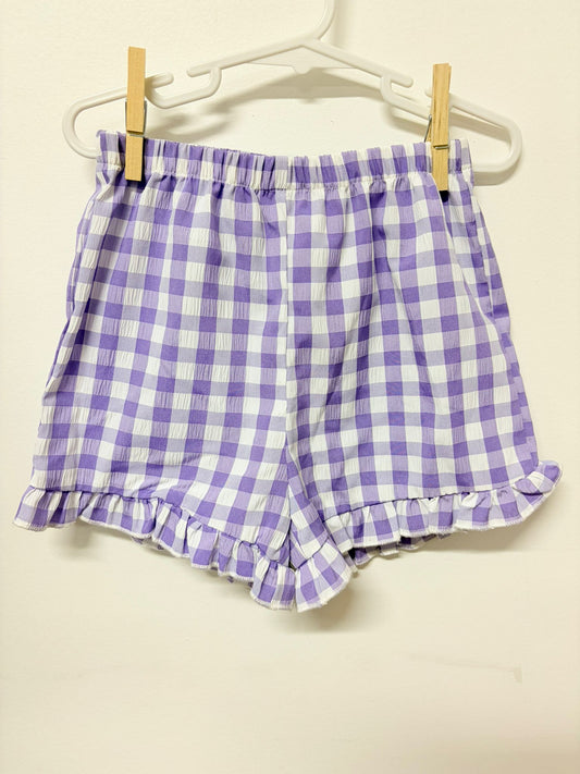Size 3 Shein lilac check shorts.