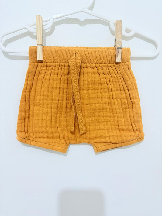 0000 Baby Berry mustard linen shorts.