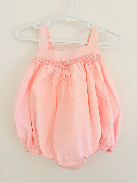 Size 00 Korango baby pink flower detail romper.