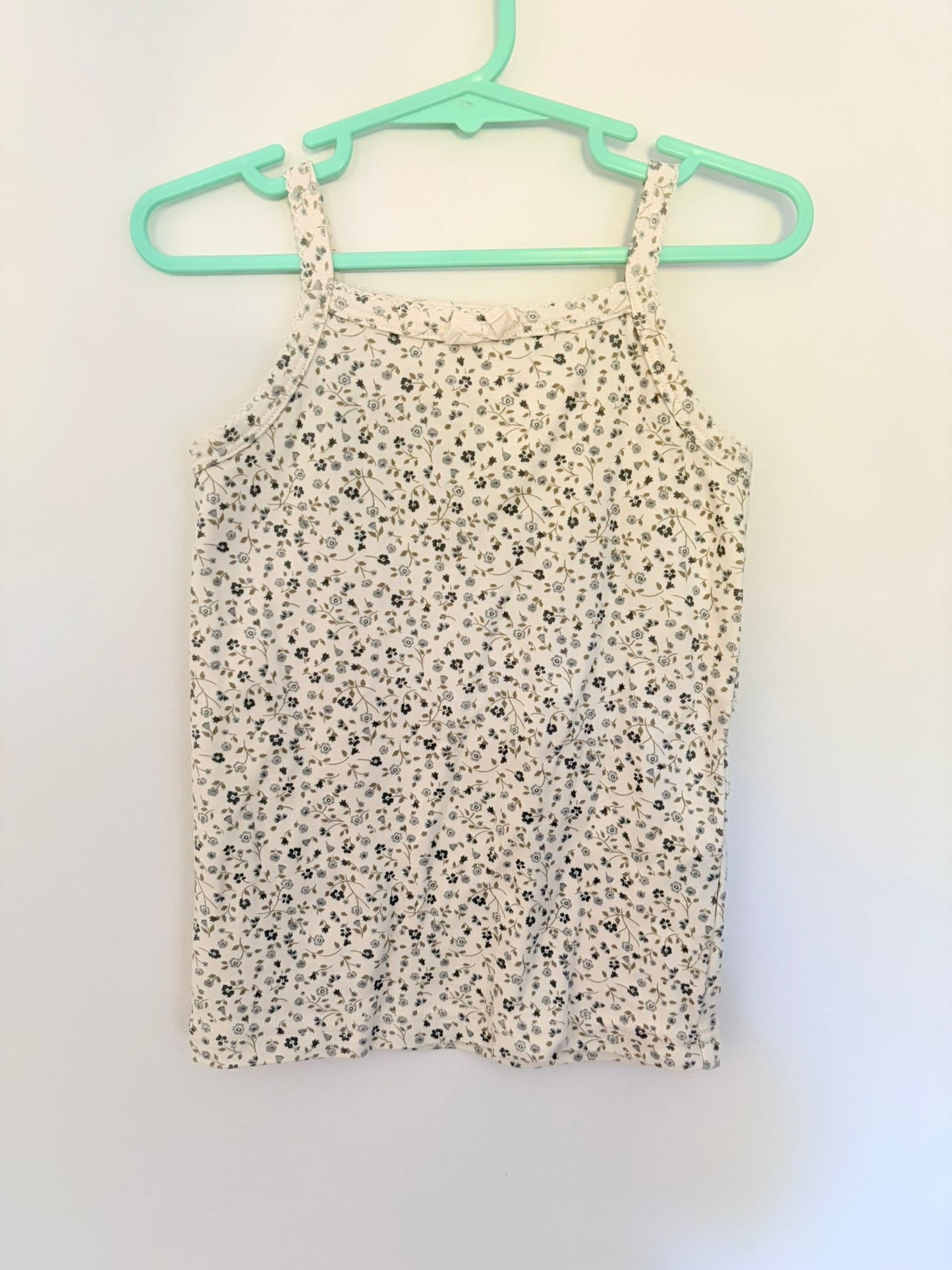 Size 4 Jaimie Kay cream vest with blue floral print.
