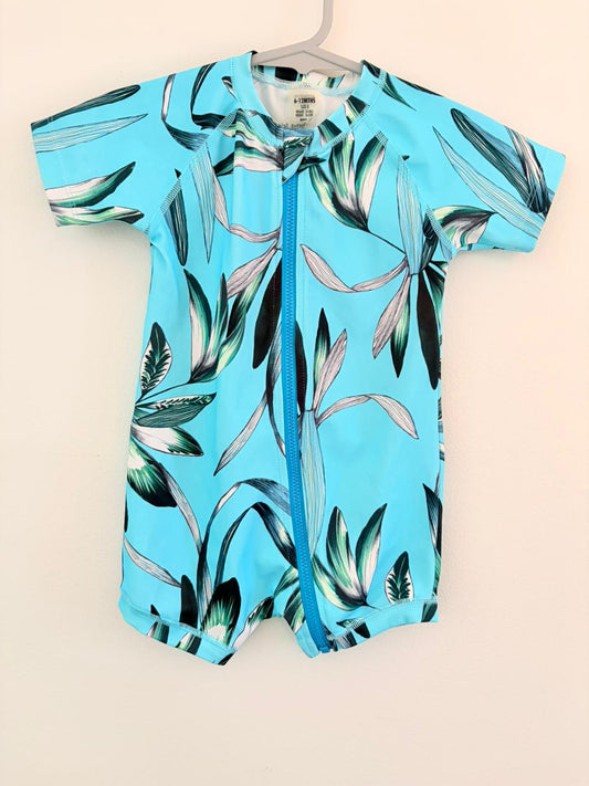 Size 0 Bonds one piece teal floral swimsuit.