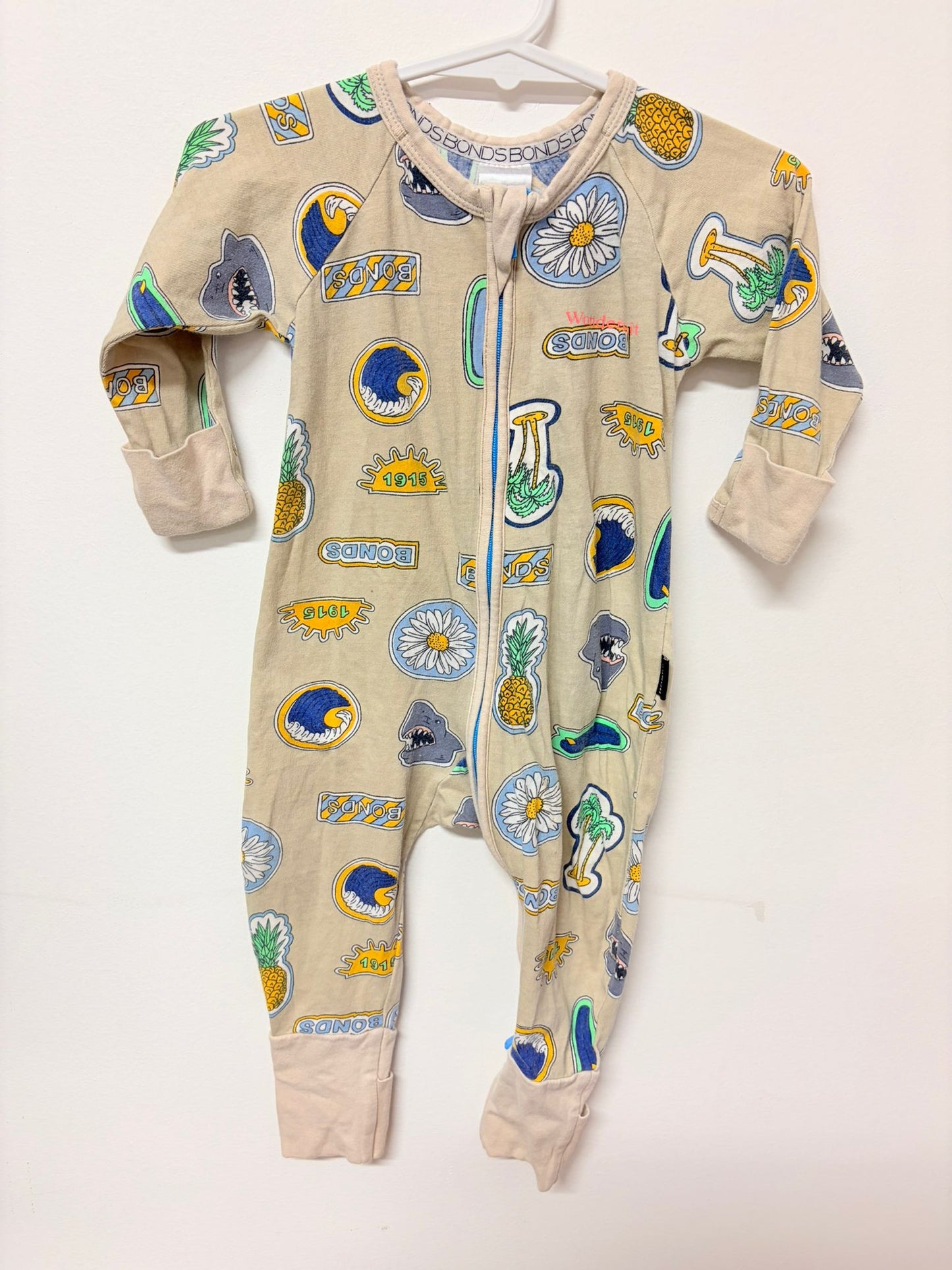 Size 00 Bonds wondersuit beige stamp print.