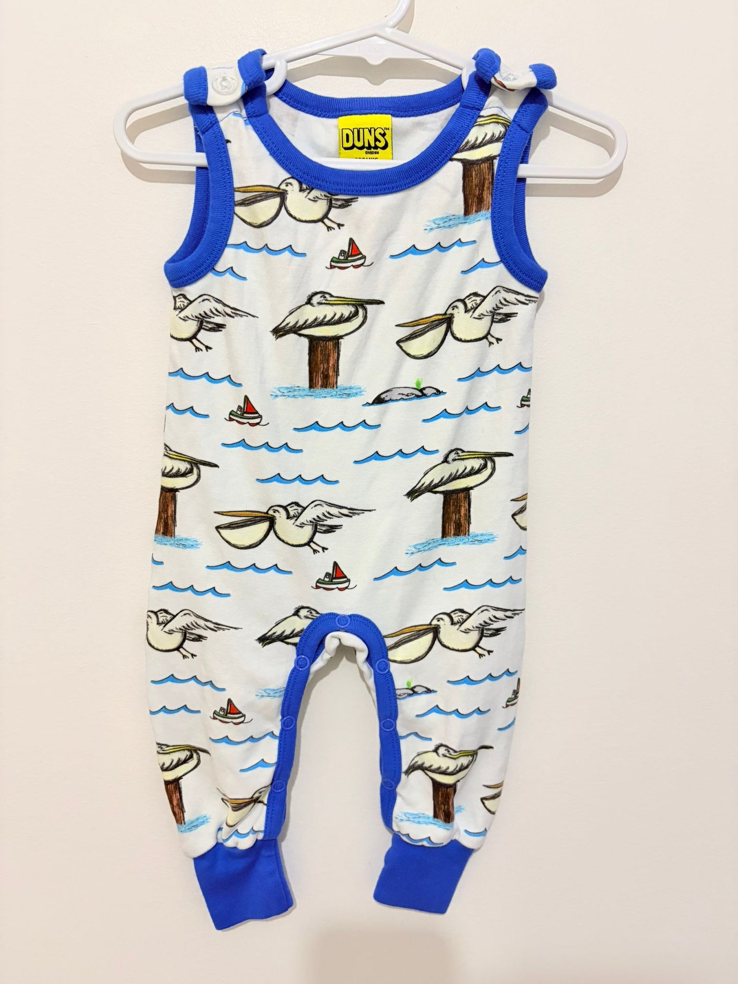 Size 00 Duns organic cotton onesie pelican print.