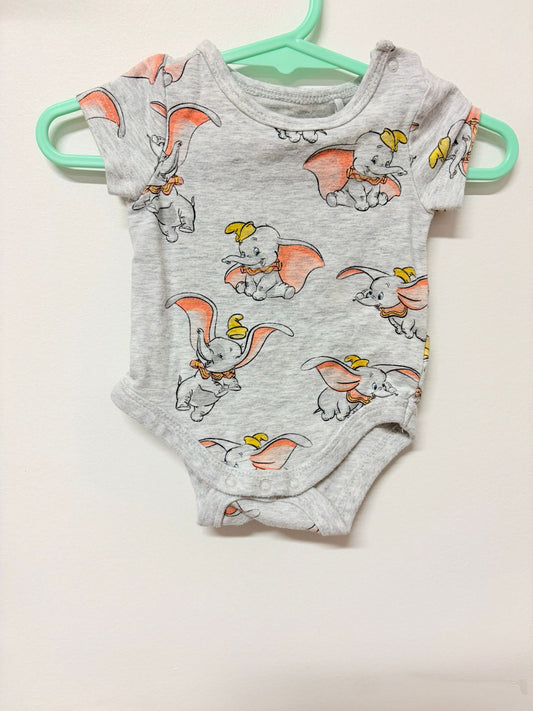 Newborn Disneys Dumbo bodysuit.