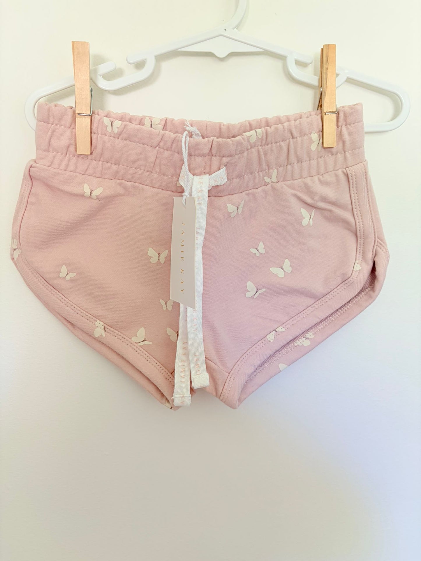 Size 4( New with tags) Jaimie Kay pink butterfly shorts.