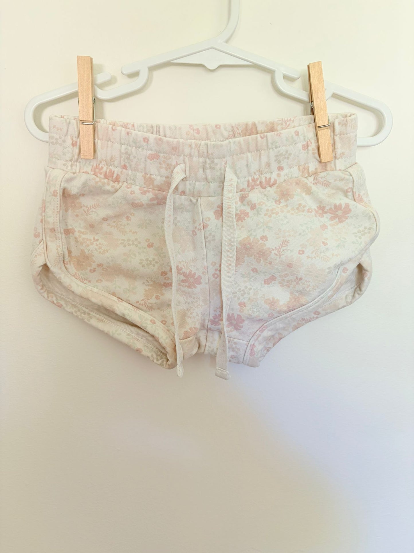 Size 4 Jaimie Kay shorts white with pink floral pattern.