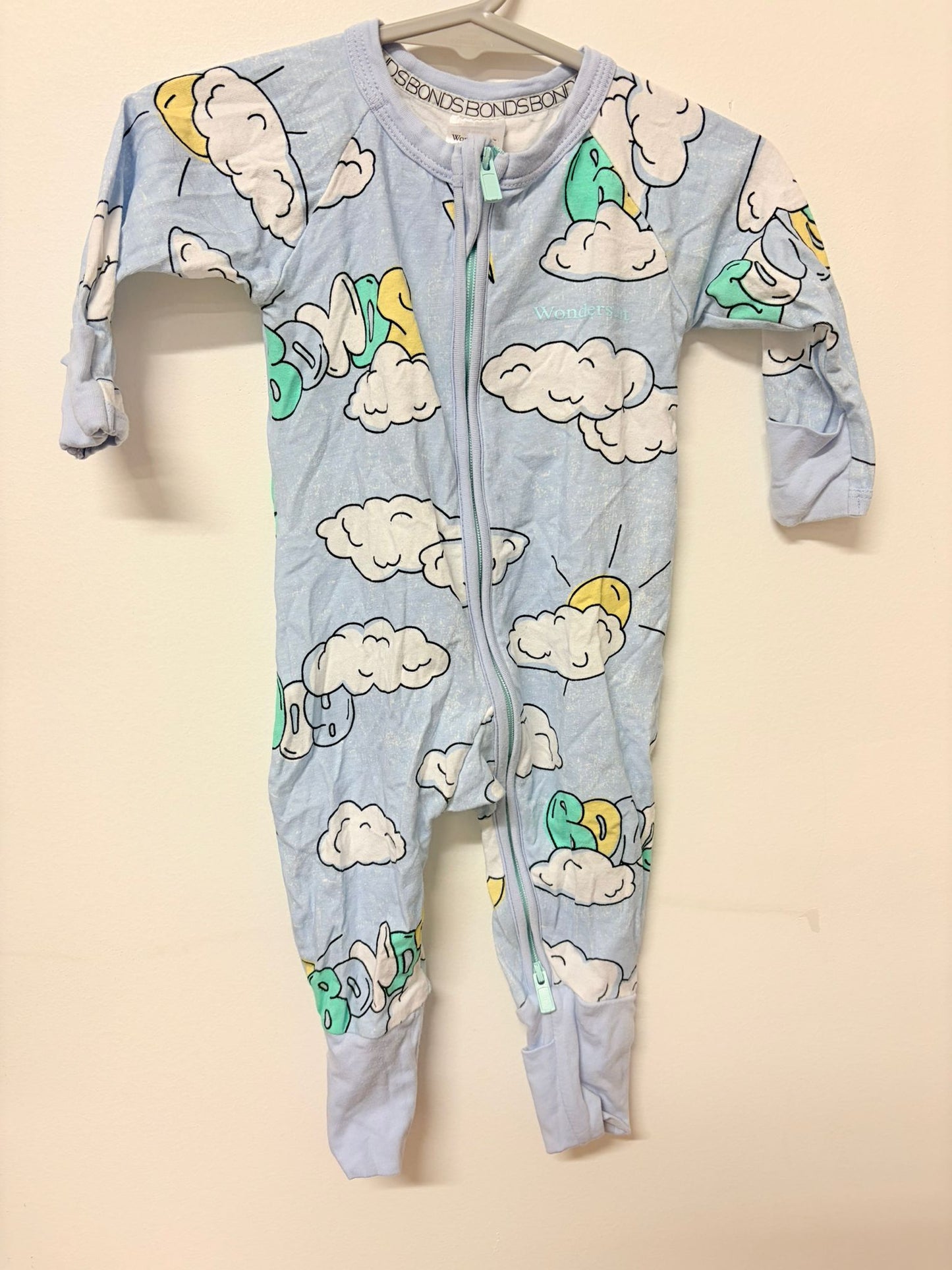 Size 000 Bonds baby blue clouds print.