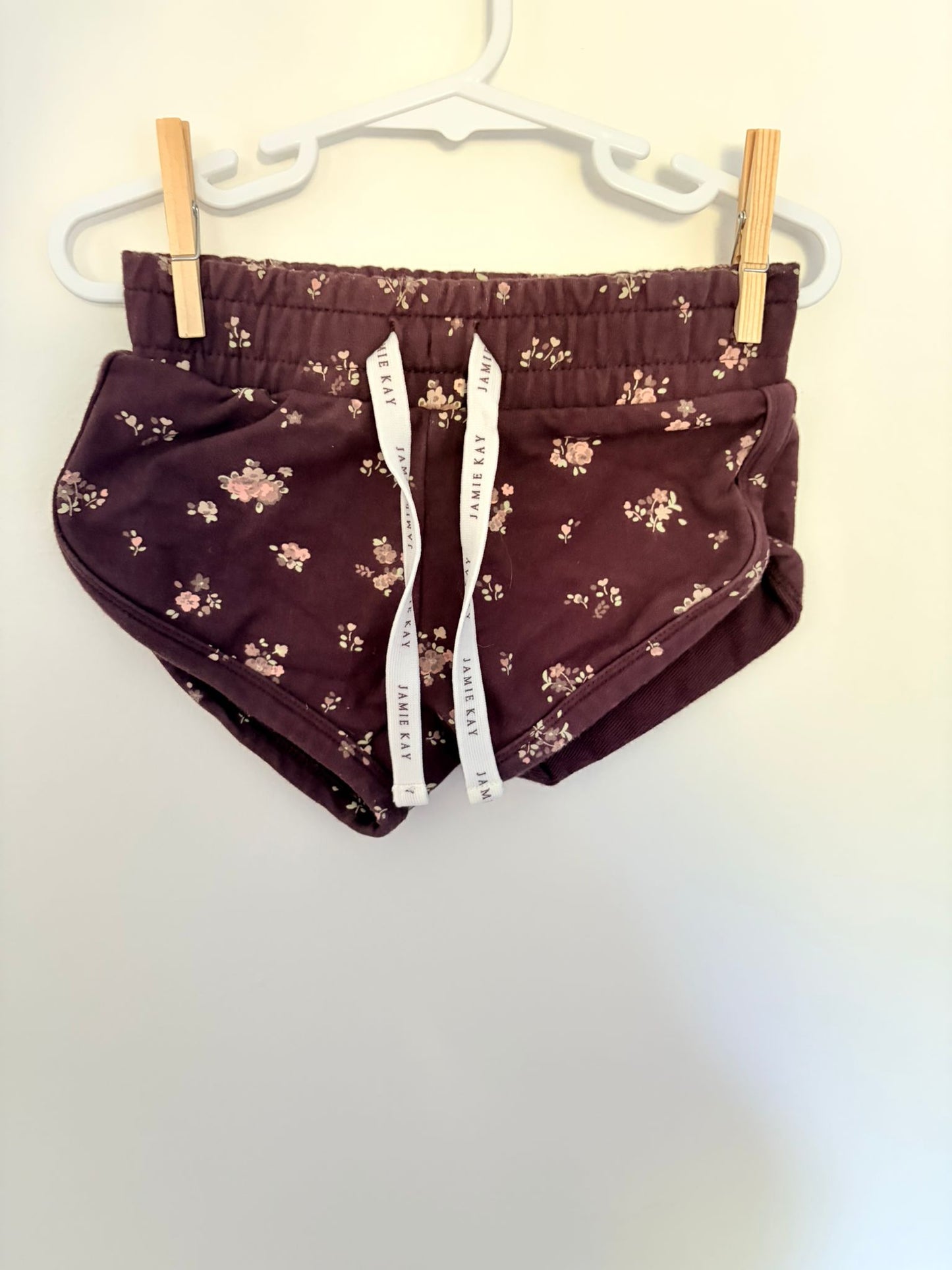 Size 4 Jaimie Kay shorts brown with floral print.