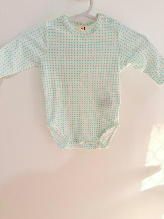 0000 Seed long sleeved bodysuit teal dots.